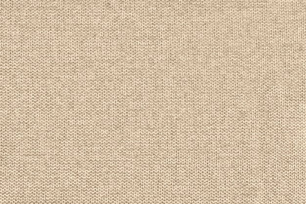 Fondo de textura de tela de cojín de sofá tejido de algodón beige Fotografía de alta resolución