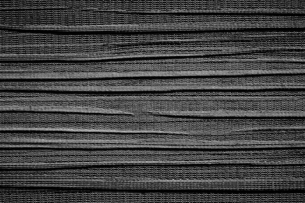 Fondo de textura de tela negra. Detalle de lona de material textil.