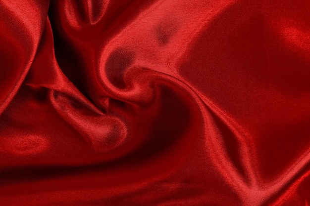 Fondo de textura de tela roja patrón arrugado de seda o lino