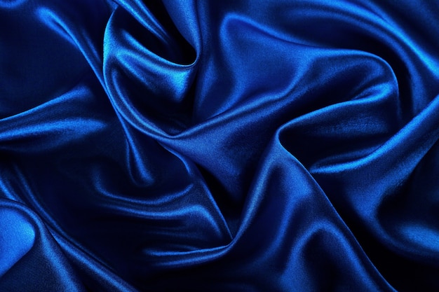Fondo de textura de tela de seda azul hermosa