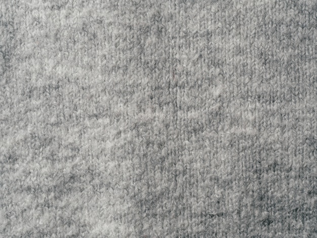 Fondo de textura de tela suéter gris
