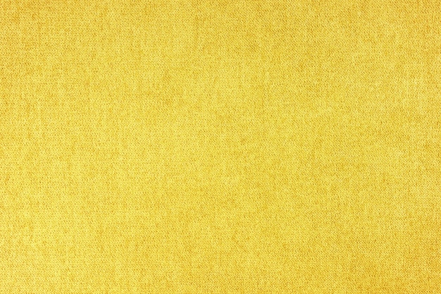 Fondo de textura de tela de tapicería de terciopelo amarillo