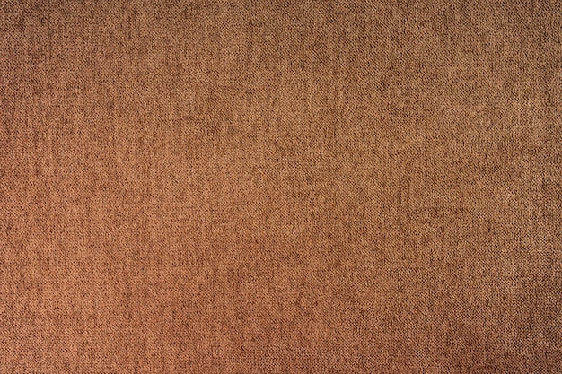 Fondo de textura de tela de tapicería de terciopelo marrón