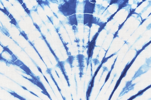 Fondo de textura de tela de teñido anudado azul para el diseño en su trabajo