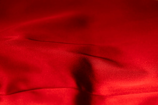 Fondo de textura de tela de terciopelo rojo