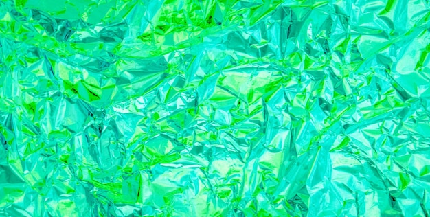 un fondo de textura verde y azul de una bolsa de plástico verde y azul