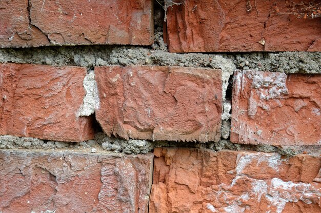 Fondo de textura de un viejo ladrillo ruinoso