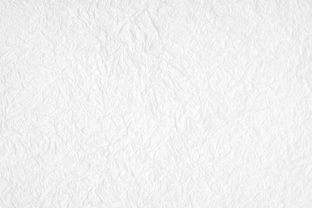 Foto fondo texturizado arrugado del papel de mora blanca, detalle cerrado