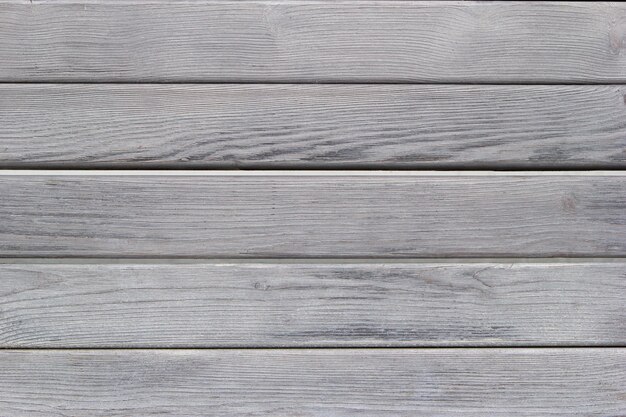 Fondo texturizado de líneas horizontales de tableros de madera gris