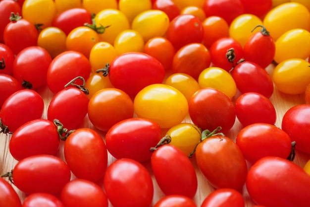 Fondo de tomate orgánico maduro rojo