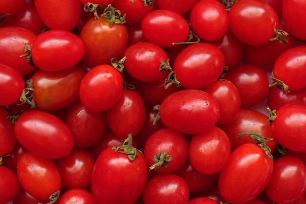 Fondo de tomate orgánico maduro rojo