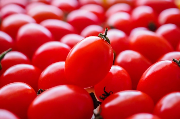 Fondo de tomate orgánico maduro rojo