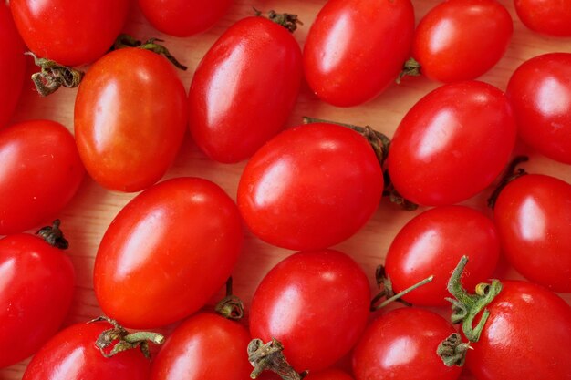 Fondo de tomate orgánico maduro rojo