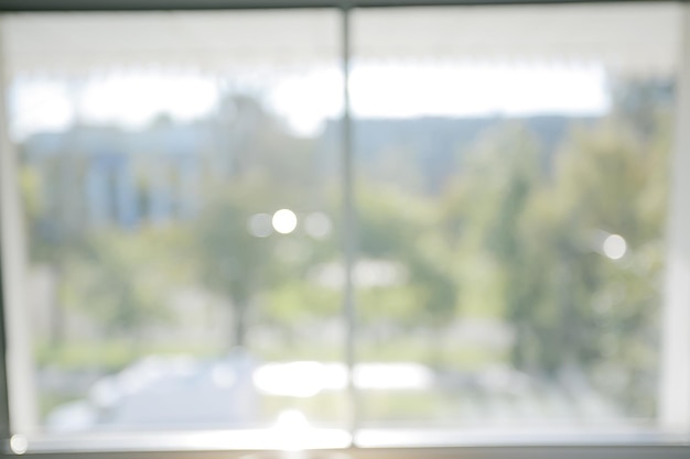 Foto fondo de ventana borrosa / concepto de comodidad en el hogar vista de ventana