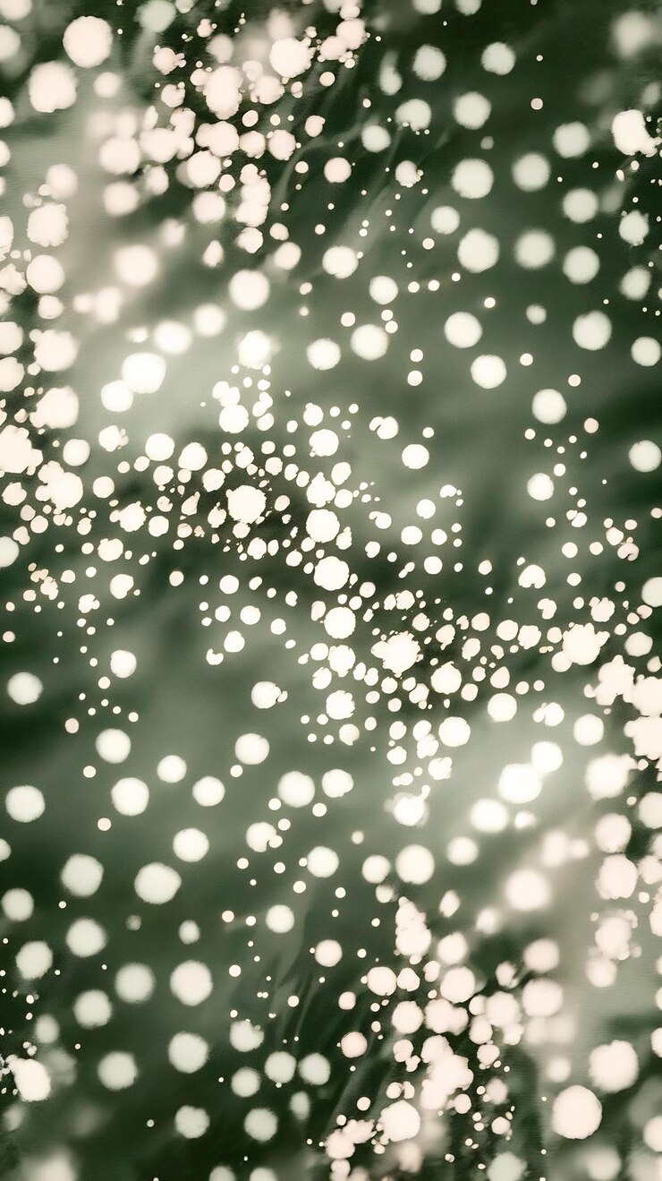 Foto un fondo verde borroso con puntos blancos