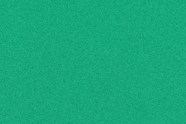 Fondo verde con motas de colores brillantes