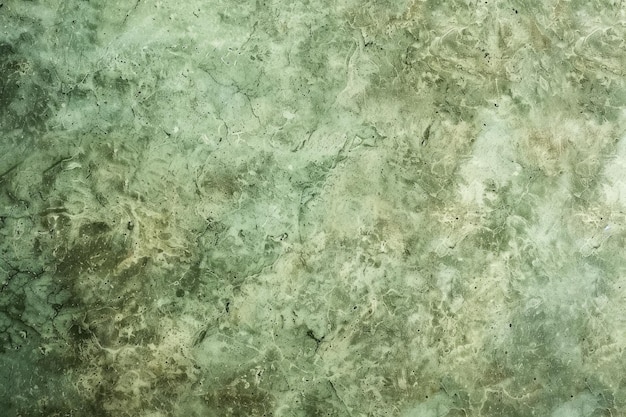 Foto un fondo verde con una textura áspera de textura áskera