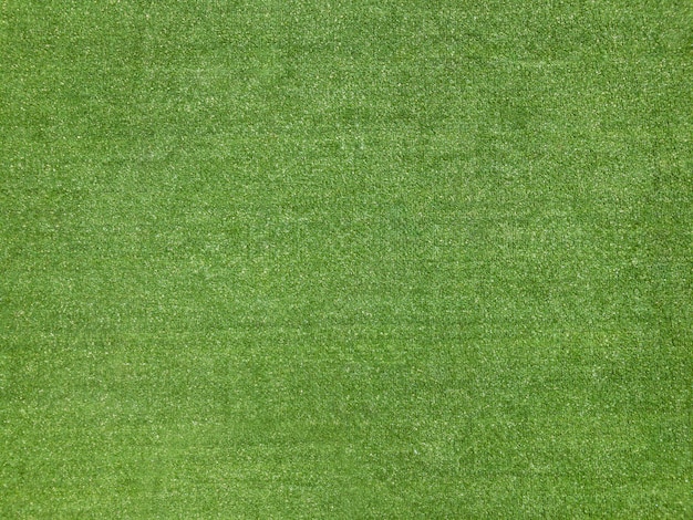 Foto fondo verde de la textura de la hierba falsa del campo de fútbol