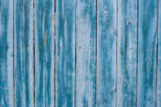 Fondo de viejas tablas de valla en azul