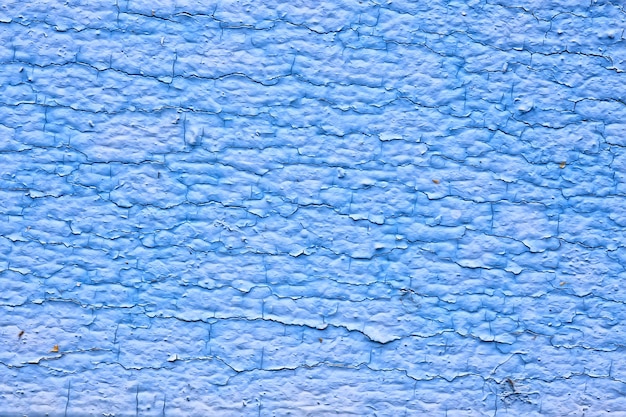 Fondo vintage abstracto de pintura azul, superficie de pelado de madera vieja