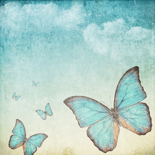 Fondo vintage con una mariposa azul