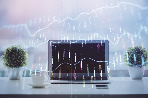 Forex-Chart-Hologramm auf dem Tisch mit Computer-Hintergrund Mehrfachbelastung Konzept der Finanzmärkte