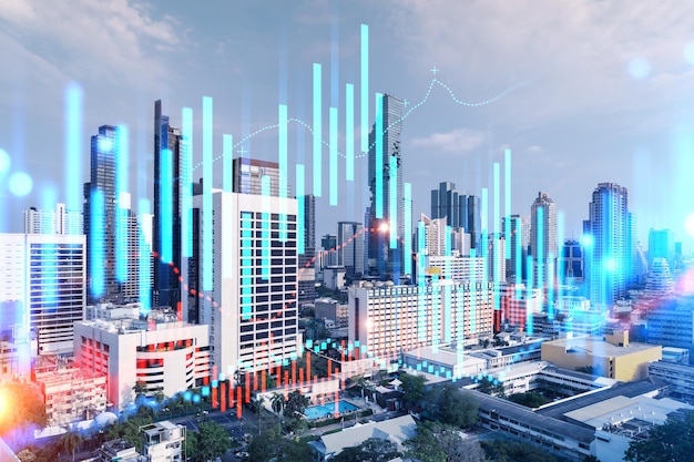 Forex e holograma do mercado de ações sobre a vista panorâmica da cidade de Bangkok, o centro financeiro da Ásia O conceito de comércio internacional Dupla exposição