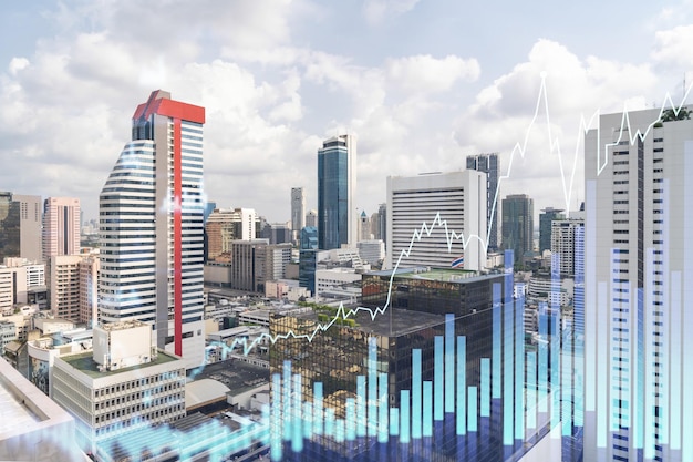 Forex e holograma do mercado de ações sobre a vista panorâmica da cidade de Bangkok, o centro financeiro no sudeste da Ásia O conceito de comércio internacional Dupla exposição