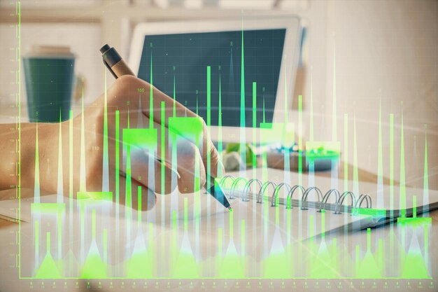 Forex-Finanzgrafik über die Hände gezeichnet, die Notizen machen Hintergrund Konzept der Forschung Mehrfachbelastung