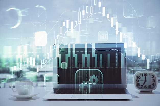 Forex-Graph-Hologramm auf dem Tisch mit Computerhintergrund Multi-Exposure-Konzept der Finanzmärkte