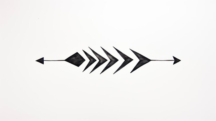 Foto forma de flecha hecha de papel blanco y negro sobre fondo blanco