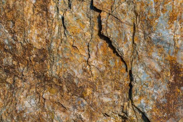 Formación de capas de roca fondo de textura de piedra multicolor