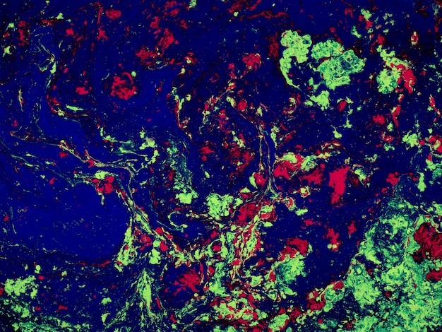 Formas de mármore coloridas abstratas para designs criativos feitos com tinta acrílica líquida em movimento