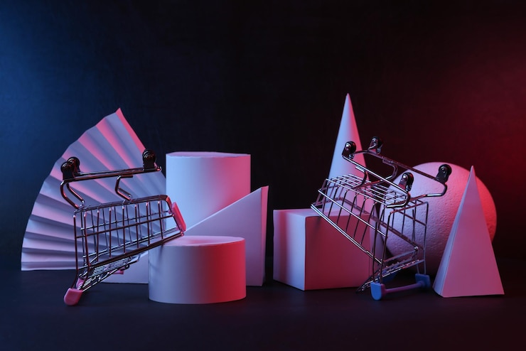 Foto formas geométricas con carrito de la compra y luz de neón con degradado rojo y azul fondo oscuro escaparate creativo surrealismo arte conceptual