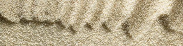 Formato de fondo de luz arenosa horizontal de banner 41 con olas de arena fotografía macro