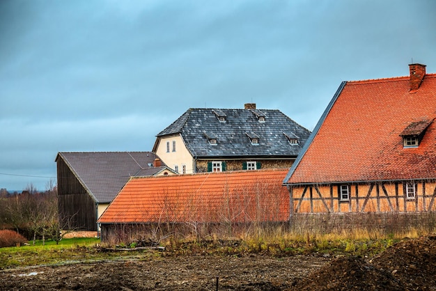 Foto antigua de la casa de la granja de la arquitectura alemana del vintage