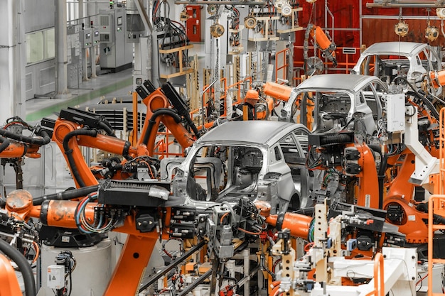 Foto da linha de produção de automóveis moderna fábrica de montagem de automóveis moderna e automotiva de alta tecnologia