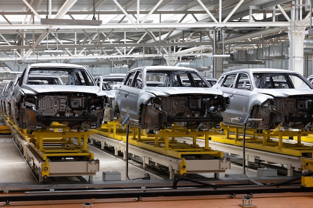 Foto da linha de produção de automóveis solda corpo do carro moderna fábrica de montagem de automóveis indústria automobilística
