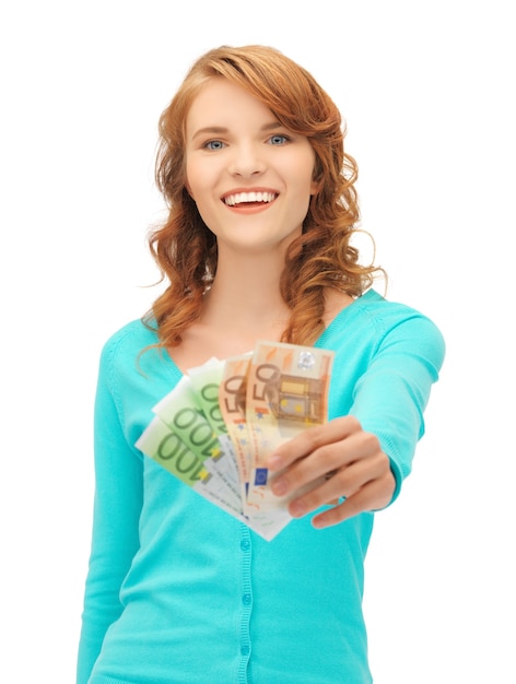 Foto foto de adolescente feliz com dinheiro em euros