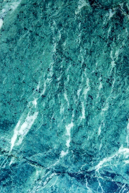 Foto foto des farbigen steinbeschaffenheitshintergrundes der steinmauer