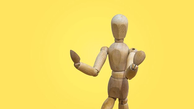 Foto de figura de madera mientras gesto de arte marcial