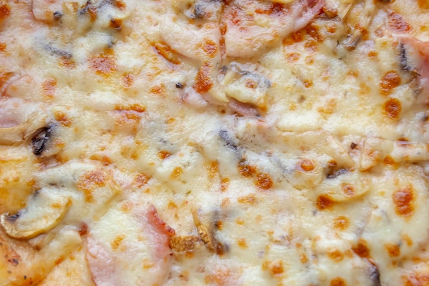 Foto de fondo de pizza con carne y queso Pizza con carne y queso primer plano