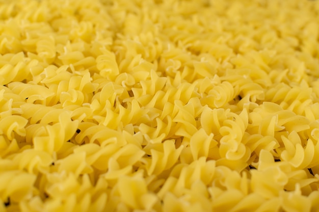 Foto macro de fundo com textura de Fusilli italiana crua