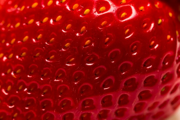 Foto macro de textura de morango. o fundo