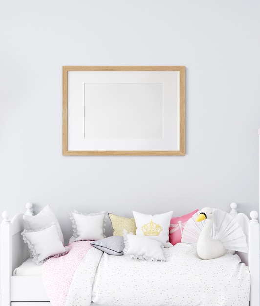 Foto de marco de maqueta en el interior del dormitorio de la habitación de los niños en la pared fondo de color blanco 3d render