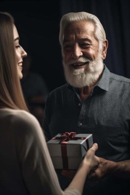 Foto de una mujer joven dándole un regalo a su padre