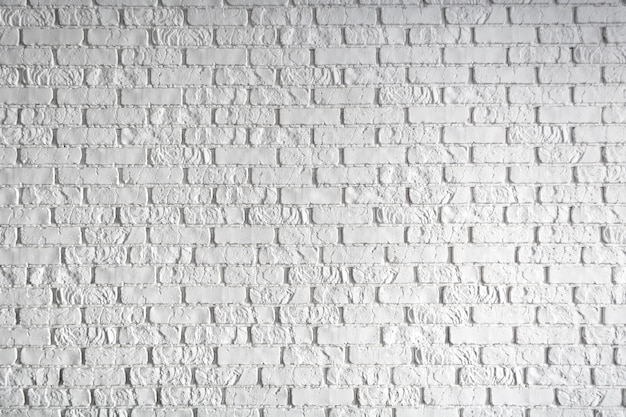 Foto de una pared de ladrillo blanco. Fondo abstracto.