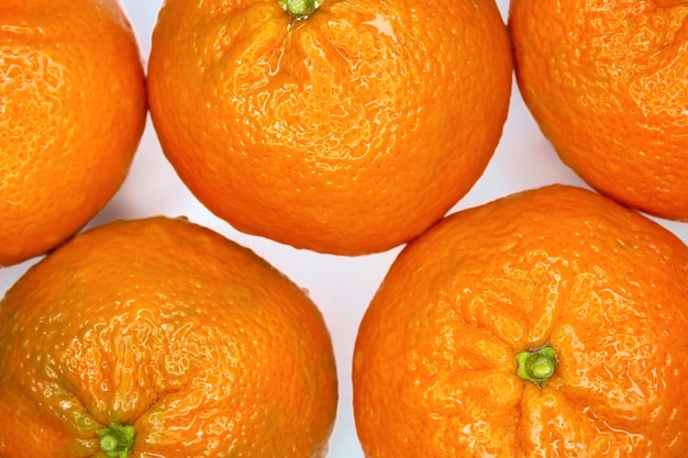 Foto de primer plano de frutas maduras de mandarina o mandarina. Cítricos saludables.