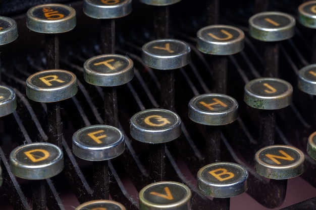 Foto foto de primer plano de llaves de máquina de escribir antigua - detalle de máquina de máquina de escribir antigua vintage