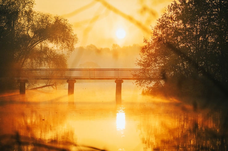 Foto foto de río, puente al amanecer.